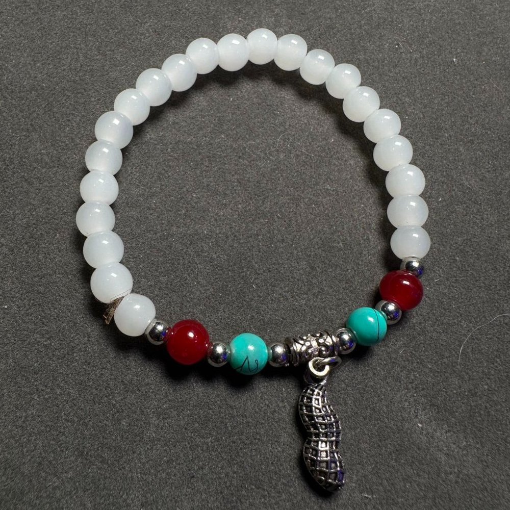 Jade racelet with silver charm 6mm